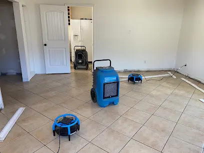 Air movers drying a floor after a water loss in Sun City, CA