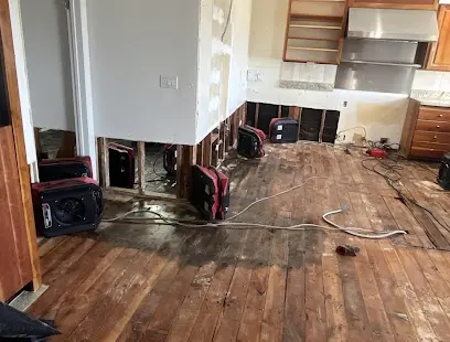 A room with flood-cut walls drying after water damage in Sun City, CA