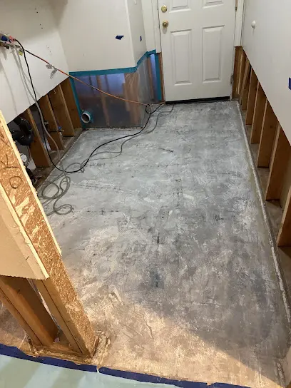 Drying equipment set up in a Sun City, CA hall after water damage