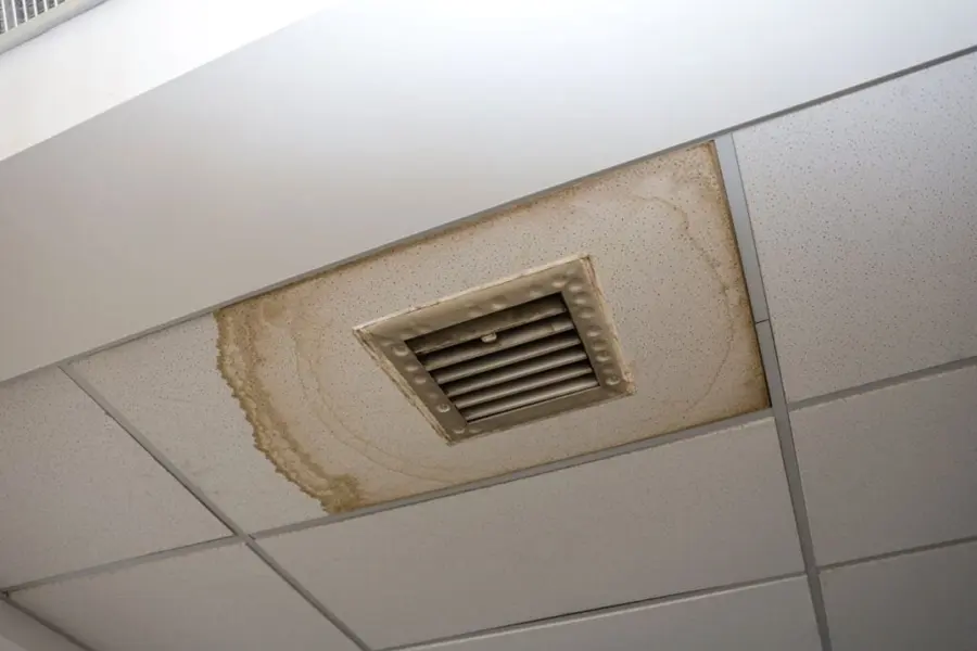 AC condensation overflow water damage on a Sun City, CA ceiling